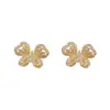 Pendientes de botón de mariposa de circón japoneses coreanos exquisitos, modernos, versátiles, elegantes, de lujo ligero, simples, únicos, de alta gama, pendientes súper brillantes para mujer
