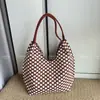 Nuevos bolsos de moda europeos y americanos para mujer, casuales y únicos, bolso de hombro de lunares de moda y genial, bolso tipo cubo, bolso de hombro, superventas transfronterizo