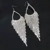 Novos brincos de corrente com garras de strass, elegantes para noivas, com pingente de gota d'água, brincos de franja exagerados E620, longos de alta qualidade para mulheres