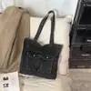 Bolsa de Ombro Tote Casual de Brim Simples de Grande Capacidade Modelo Novo Verão 2026 Cor Sólida para Mulheres para Trabalho e Deslocamento