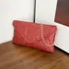 Bolso de mano tipo sobre con cadena de moda estilo coreano, modelo nuevo 2026, alto valor estético, simple y elegante, versátil, bolso de hombro y cruzado texturizado