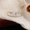 Pulseira Borboleta de Zircônia com Fivela de Camada Dupla Coreana Exquisite Versátil de Nicho Luxo Leve Acessórios de Mão de Alta Qualidade Atacado Feminino