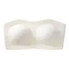 Sutiã strapless plus size europeu e americano para mulheres com seios grandes, apresentando um design de sustentação, antiderrapante, sem costura e sem aro na cor nude.