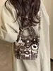 Bolsa Balde Infantil Popular de Desenho Animado Fashionável Feminina 2026 Nova Casual Retrô de Alto Valor Ombro Único Transversal