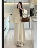 Roupa de Maternidade Estilo Celebridade da Internet 2025 Outono e Inverno Novo Suéter de Lã Espessa com Mangas Sino Saia Terno Elegante