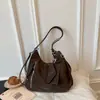 2026 Mochila Nueva de Gran Capacidad Pequeña Múltiples Bolsillos Traseros Diseño Hermoso Elegante Versátil Casual Bolso de Hombro