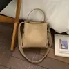 Bolso Cruzado de Hombro Único con Diseño de Nicho Estilo Coreano Bolso de Mano Tipo Cubo Modelo Nuevo 2026 con Textura de Lichi Casual Versátil