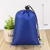 Bolsa de almacenamiento para acabado de ropa de nailon con bolsillo y cordón de poliéster, venta al por mayor de fábrica, cordón de poliéster