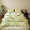 Conjunto de cuatro piezas de jacquard lavado estilo minimalista con botones, sábana bajera y funda nórdica de algodón lavado, juego de tres piezas de sábana bajera ajustada para dormitorio de estudiante 4