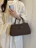 Bolso tote texturizado transfronterizo para el día a día 2026 nuevo vintage simple de mano moderno versátil de gran capacidad para mujer