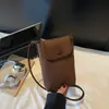 Transfronteiriça 2025 Nova Bolsa Feminina Popular de Alta Qualidade Bolsa de Ombro Estilo Coreano Porta-Moedas Simples Bolsa Transversal Vertical para Celular