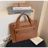 Bolso Grande de Mujer Estilo Coreano Transfronterizo de Nicho 2025 Nueva Moda Versátil Bolso de Oficina Bolso de Mano Simple de Gama Alta