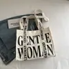 Otoño e Invierno 2025 Nuevo Estilo Color de Contraste Estampado de Letras Correa de Hombro Colorida Bolso de Lona Casual para Mujer Bolso de Hombro Único Bolso Cruzado