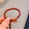Goma para el pelo simple, duradera y de alta elasticidad, nueva moda 2025, cara sonriente, cuerda para el pelo engrosada, accesorios para el pelo, venta al por mayor