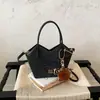 Bolso de mano de moda con estampado de leopardo transfronterizo para mujer, nuevo y elegante bolso tote tipo cubo de alto valor, versátil bolso de hombro y cruzado