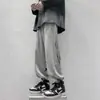 Calça de fleece forrada europeia e americana 2026, marca trendy de alta rua ins, com cordão, asa estilosa, jogger legal, calça esportiva casual para homens