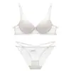 Conjunto de lencería sexy de encaje transfronterizo para mujer, estilo francés, escote en V profundo, realce para busto pequeño, sujetador push-up con soporte lateral
