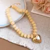 Collar de doble capa con cuentas acrílicas transfronterizo europeo y americano, cadena para la clavícula de lujo ligero de alta gama, joyería de estilo étnico vintage al por mayor