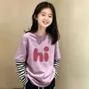 Camiseta de manga larga de algodón puro con retazos a rayas para niñas, versátil, para primavera y otoño, para niños mayores, estilo coreano, corte holgado, efecto dos piezas, moderna