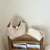 Bolsa Tote Saco Estilo Coreano Retrô Feminina 2026 Nova Casual Mãe-Filho Bolsa de Ombro Único Cor Sólida Nicho Comute Bolsa Transversal
