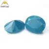 Forma de huevo abuela verde nano piedra desnuda ovalada pino verde en stock directo Wuzhou gema artificial al por mayor