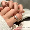 Chen Mo Nuevo Estilo Anillo de Dedo Abierto Ajustable Espiral Incrustado de Diamantes Micro-Pavimentado con Circonita Perla Nicho Sentido de Alta Gama Lujo Ligero