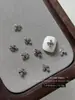 1000 piezas Plata Antigua Cruz Arte de Uñas Aleación Adornos Estilo Oscuro Punk Flor Decoración de Uñas Bolsa Completa Personalizado Venta al por Mayor