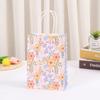 Bolsa de papel Kraft con estampado de flores bolsa de embalaje de flores coloridas estilo ins bolsa de regalo simple bolsa de embalaje pequeña fresca