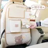 El organizador de asiento trasero de coche Blue Rain, con diseño de oso y conejo de dibujos animados, es una bolsa de almacenamiento que se puede colgar en el respaldo del asiento del coche para evitar que los objetos sean pateados.