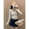 Suéter tejido suave y acogedor con textura estilo Miu para mujer, otoño e invierno, cuello polo, corte ajustado, top corto