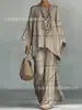 Nuevo conjunto de dos piezas para mujer: camiseta casual de moda con estampado transfronterizo, cuello redondo, manga larga + pantalones de campana