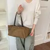 Bolso tote vintage de textura de alta calidad para mujer 2026 bolso casual de gamuza de un solo hombro de gran capacidad para llevar en la mano