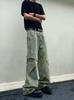 Pantalones vaqueros holgados de pierna ancha con diseño americano deconstruido, de color amarillo barro, lavados, estilo retro desgastado de industria pesada, con ambiente de calle alta