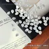 Pedras de strass para nail art com zircônia de base reta em formato de gota d'água, pedras de strass facetadas irregulares brilhantes em formato de flor para decoração de unhas