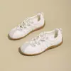 Zapatillas de entrenamiento estilo alemán plateadas para mujer 2026 nuevo otoño suela gruesa con cordones zapatos casuales estudiante cómodos versátiles zapatos blancos zapatos de skate
