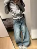 Jeans retro americanos de cintura alta con corte curvo para mujer, estilo primavera y otoño, diseño de alta costura, corte holgado, adelgazante, pantalones de pierna ancha con caída