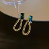 Pendientes de mariposa y flor de circón verde ultrabrillante transfronterizos, sensación de lujo ligero de alta gama, pendientes versátiles con un diseño único