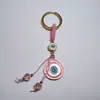 Colgante de Serie Ojo de Diablo Transfronterizo Europeo y Americano Colgante de Llavero de Joyería de Animales Ojo de Hueso con Goteo de Aceite Accesorios de Aleación para Mujeres