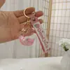 Llavero de Botella de Arena Líquida de Dibujos Animados, Pequeños Regalos para Puestos, Accesorios Acrílicos al por Mayor, Colgante Relleno de Aceite, Rasca Gatos Lindo de Regalo