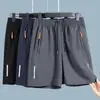 Pantalones Cortos Deportivos para Hombre de Tallas Grandes, Seda Helada de Secado Rápido, Rectos Holgados de Color Sólido, Raya Reflectante, Pantalones Cortos de Cinco Puntos, Pantalones Cortos de Secado Rápido para Hombre