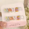Popular Patch de Manicure Dudu Bear Laço Glitter Unhas de Fototerapia 10 Peças Codificado Feito à Mão Unhas Vestíveis Venda por Atacado