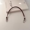 Corda de pulso fivela curta corda de couro PU corda curta capa de fone de ouvido corda corda de pulso DIY cor capa de telefone celular para homens e mulheres