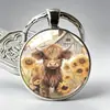 Serie de Llaveros con Diseño Creativo de Venta Caliente Transfronteriza Vaca con Relieve Rosa de las Tierras Altas Colgante para Bolso de Aleación de Gema del Tiempo