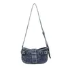 Bolsos de mujer de moda transfronterizos 2026 otoño nuevo bolso de hombro cruzado retro de mezclilla bolso nicho de viajero bolso tipo albóndiga