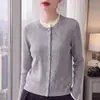 Novo conjunto de duas peças de outono e inverno, cardigã de tricô com gola redonda e padrão torcido para mulheres, peça externa macia e aconchegante de caimento solto do fabricante