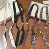 Collar de Bufanda de Seda con Perlas de Lunares Retro para Mujer 2026 Nueva Llegada Diseño de Nicho Cadena para Colgar en el Cuello de Suéter Capa Exterior para Superponer