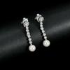 Pendientes de novia de joyería europea y americana, pendientes diarios que combinan con todo, pendientes largos de perlas, pendientes de circonitas de lujo ligeros.