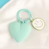 Nuevo Colgante Llavero de Coche Corazón de Durazno Lindo Dibujo Animado Cara Sonriente Anillo de Metal Accesorios para Llaves Accesorios para Bolsos de Pareja