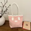 Bolsa tote de gran capacidad, nueva colección verano 2026, adecuada para el trabajo y los desplazamientos, con detalle de lazo, se puede llevar como bolso de hombro, bolso de mano o bolso de axila