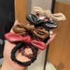 Corea del Sur Dongdaemun Estilo Xiaoxiang Cuerda para el Cabello con Lazo de Charol Cubierta de Cuero Linda Oreja de Conejo Círculo Intestinal Pequeño Corazón de Chica Banda de Goma